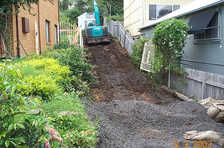 Excavator on driveway