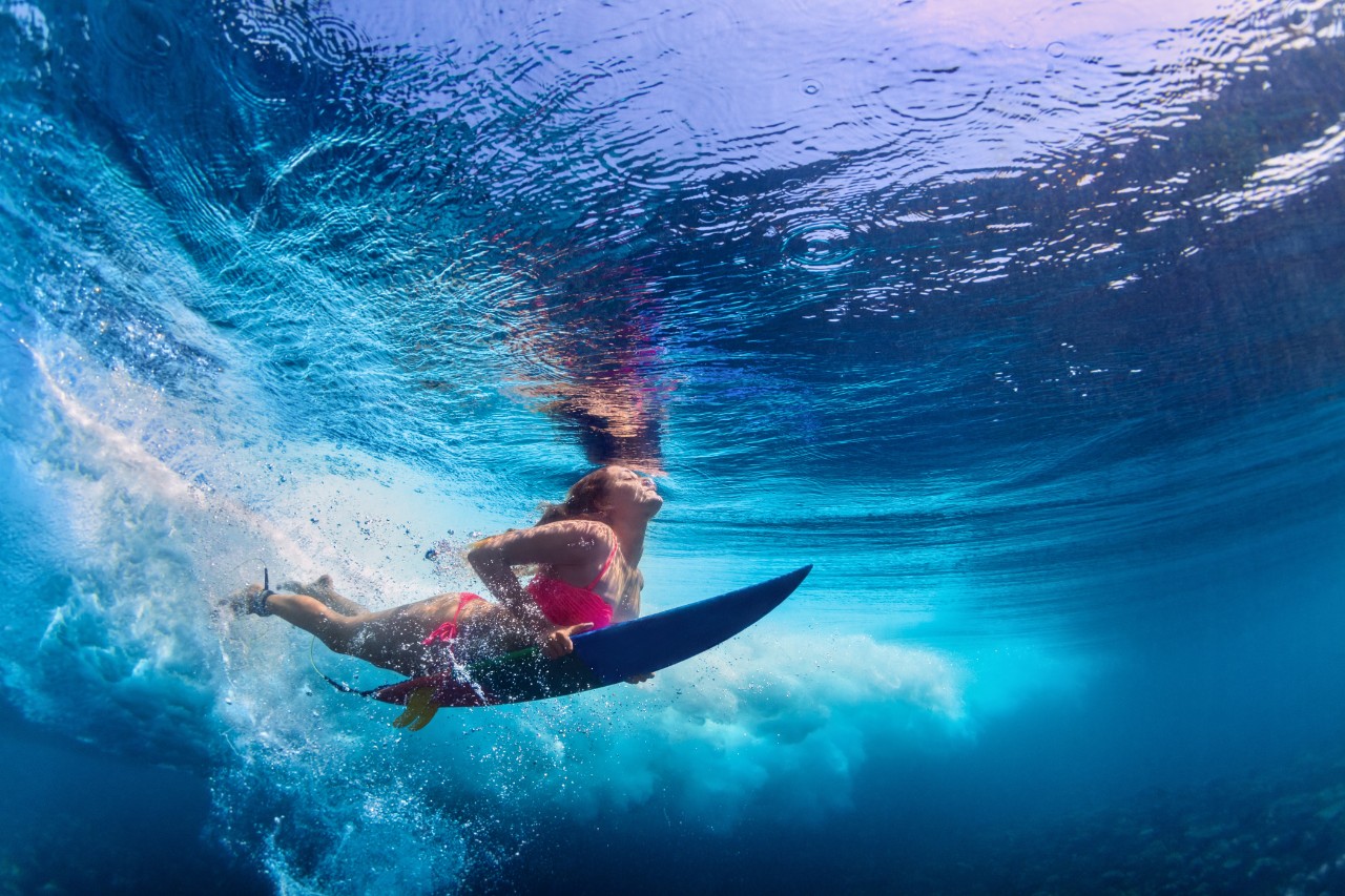 customers enjoying clean waterway with paddle board