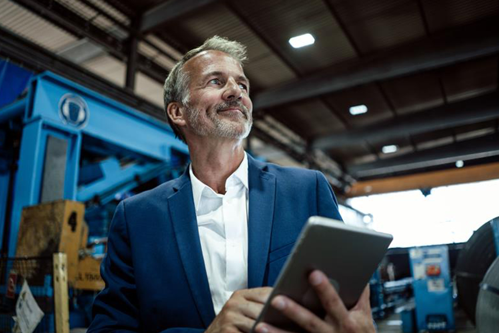 Customer holding book in warehouse