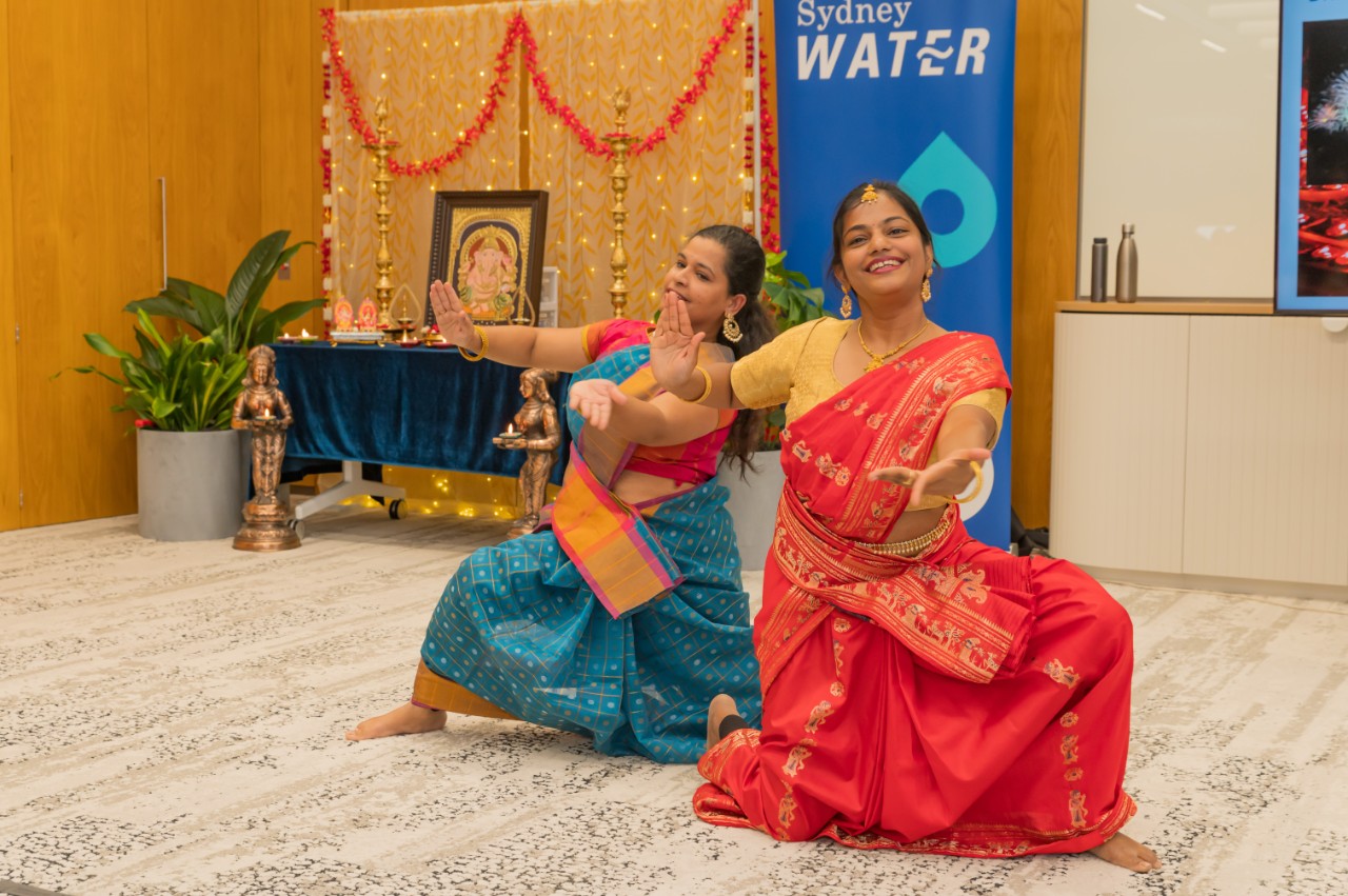 Sydney Water employees doing a traditional performance for Diwali.