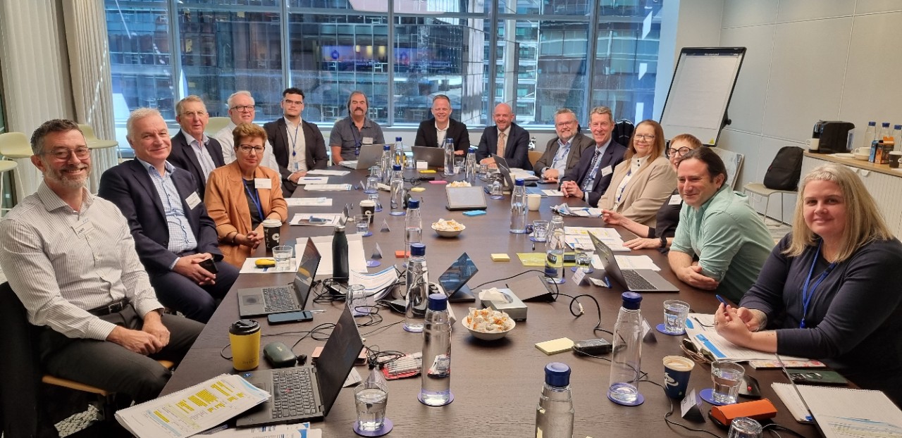 People at meeting table.
