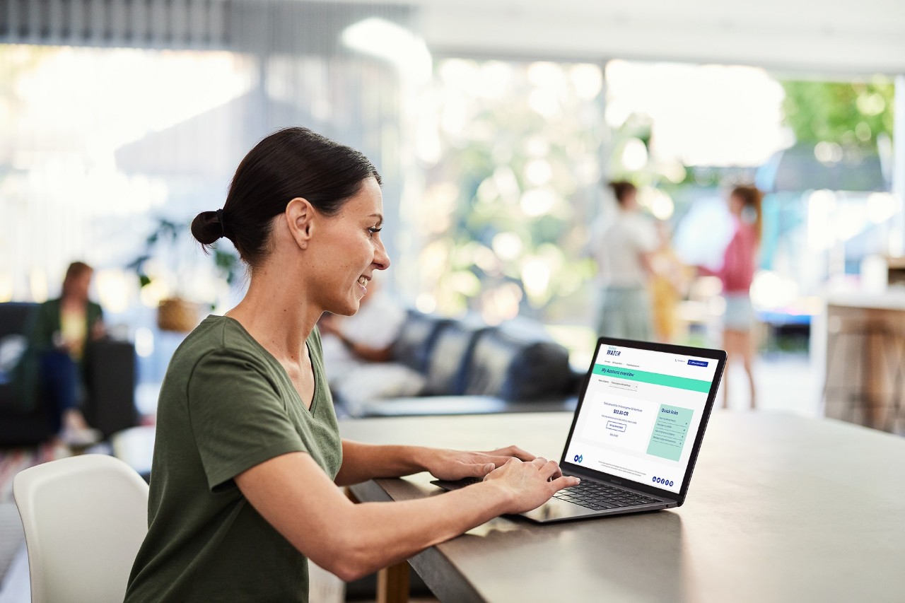 Woman using laptop to access My Account.