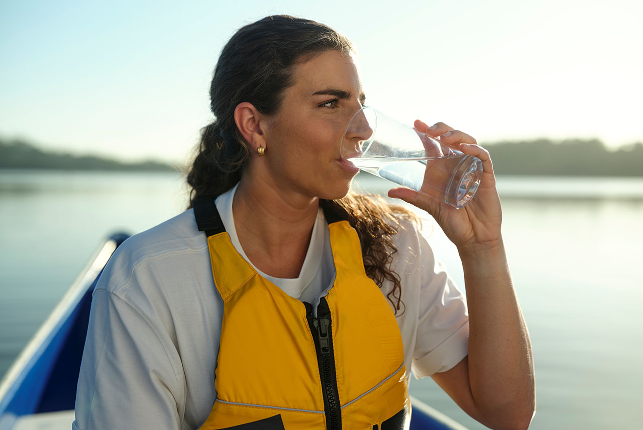 Jess fox in a canoe on the water