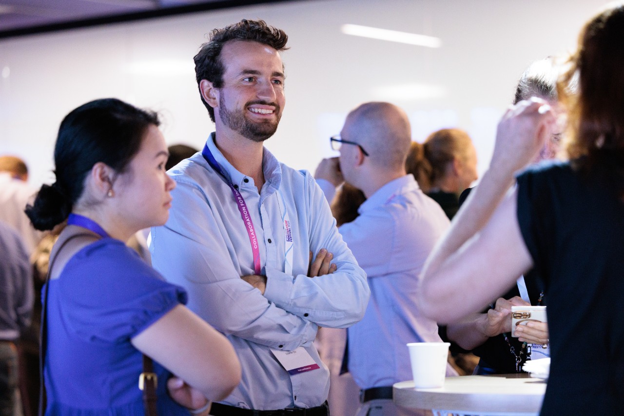 3 people in discussion at SWIF25 VIP networking event