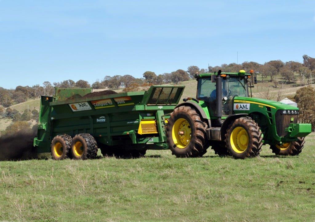 A photo of a tractor applying biosolids.