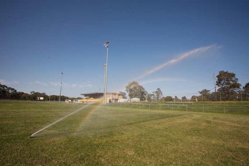 Sprinkler on a sportsfeild.