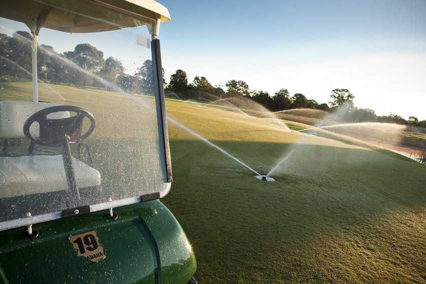 Golf course being irrigated with recycled water.