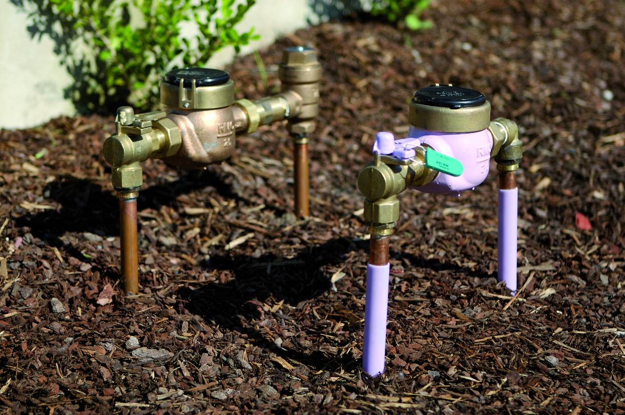 A purple water meter.