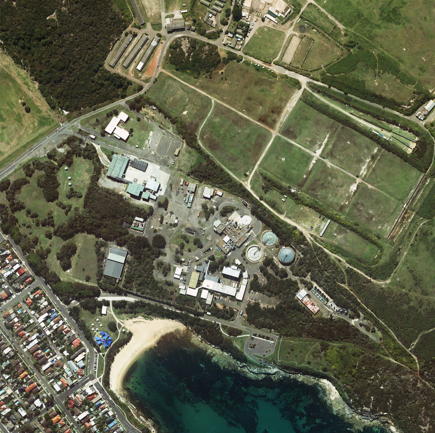 Aerial view of the Malabar wastewater treatment plant surrounded by land and houses