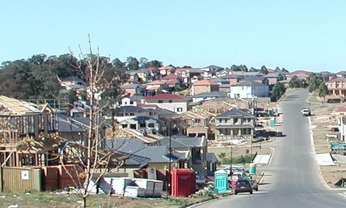 Houses being constructed next to road
