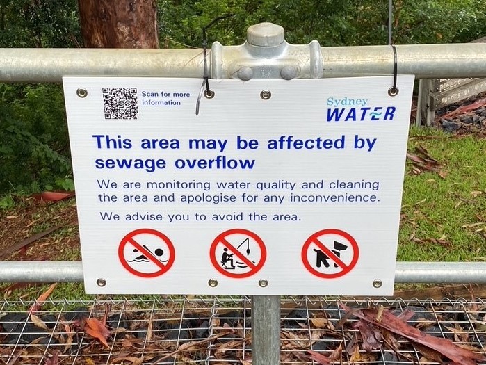 A typical wastewater overflow warning sign