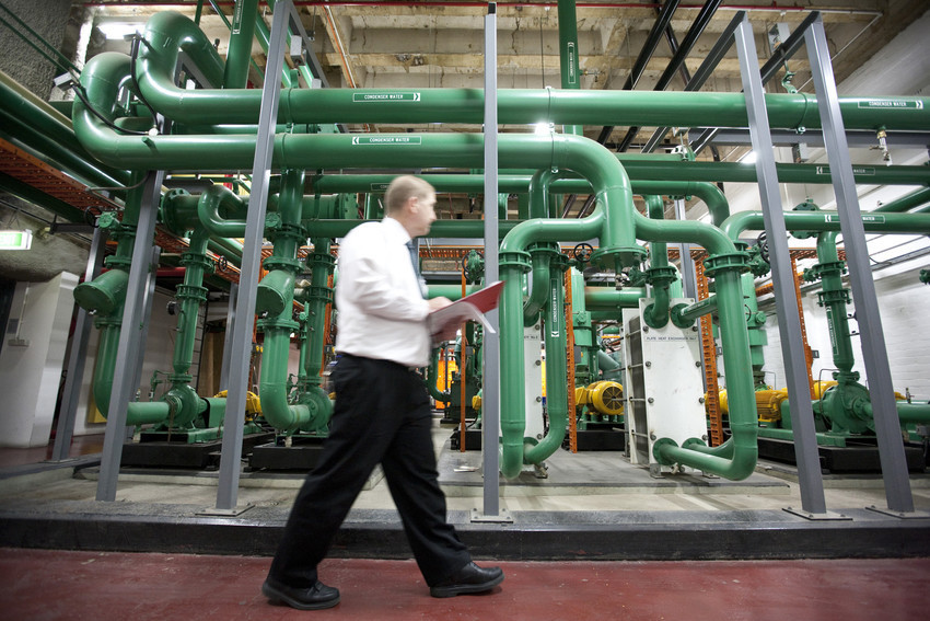 Customer walking in front of internal pipes